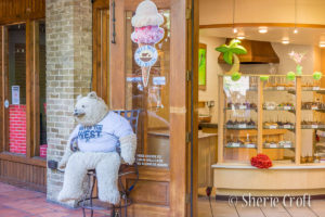 A giant, stuffed bear sits outside the chocolate shop at the River Walk in San Antonio, Texas.